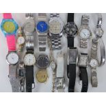 A tray of modern gents and ladies watches.
