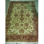 A beige ground ziegler carpet; 230cm x 160cm.