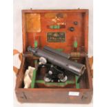 A theodolite level in fitted case as made by E.R.Watts & Son Ltd of London.