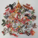 A quantity of play-worn plastic 'Cowboys & Indians' figures and others, also a die-cast cannon.