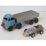 A Mettoy Castoy Articulated Lorry c1950s with clockwork motor, approx 18.5cm long.