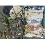 A box of mixed US and British military camo sets including US Desert tri-colour Marine issue,