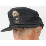 A WWII German SS Panzer Deaths Head M43 cap.