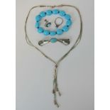 A silver Native American bolo style necklace,