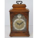 An Elliott mantel clock retailed by W.A.