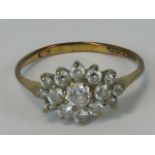 A 9ct gold white stone cluster ring, hallmarked 375, size J-K, 1.