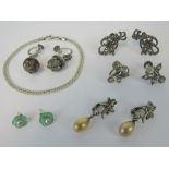 A quantity of silver and white metal jewellery including; marcasite set earrings,