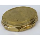 A Kigu Concerto musical compact with mirrored lid, 8cm wide.