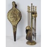 A brass fireside companion set complete with poker, tongs, brush and pan, standing 37cm high.