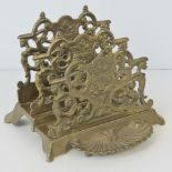 A heavy brass Art Nouveau letter rack with scallop shell tray to front, standing 13cm high.