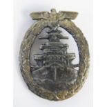 A WWII German Kriegsmarine High Seas Fleet badge, stamped 'FEC Adolf Bock Ause. Schwerin Berlin'.