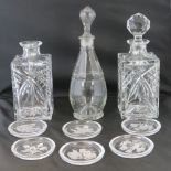 A pair of square glass spirit decanters (one stopper deficient),