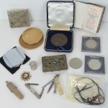 A quantity of assorted collectables including; Craft Masonary ceremony book, commemorative coins,