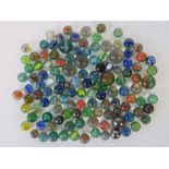 A collection of vintage glass marbles and ball bearings,