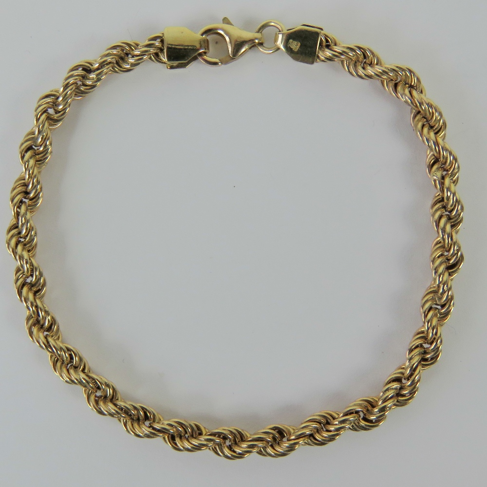 A 9ct gold rope chain bracelet, 20cm in length, hallmarked 375, 5g.