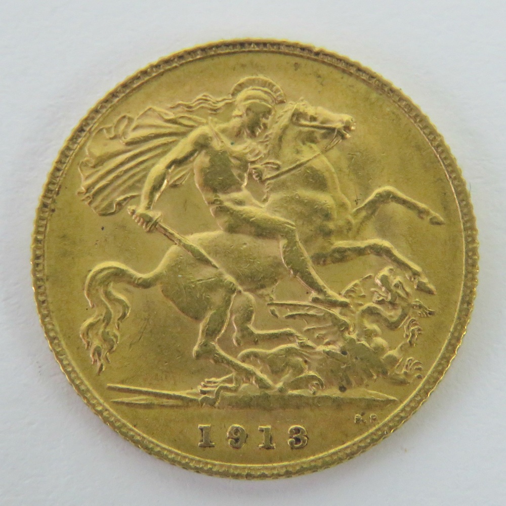 A 22ct gold half sovereign, George V 1913, - Image 2 of 2