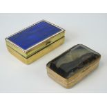 A yellow metal Victorian snuff box with Bristol blue guilloche enameled top, 6cm x 4cm x1.5cm, 63g.