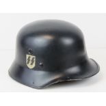 An extremely rare WWII German SS Guards double decal 'Vulkan Fibre' helmet, one crack to side,