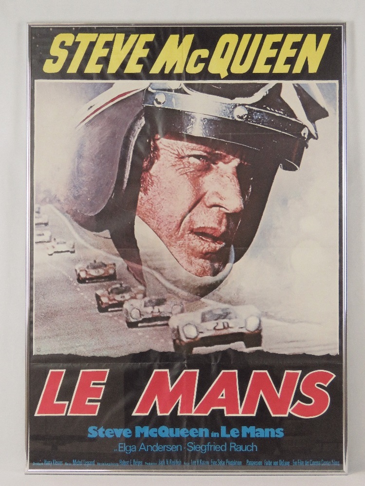 A vintage Steve McQueen Le Mans movie poster c1971, in full colour and framed, measuring 83 x 58cm.