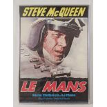 A vintage Steve McQueen Le Mans movie poster c1971, in full colour and framed, measuring 83 x 58cm.