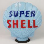 A vintage original glass advertising petrol pump globe for Super Shell,