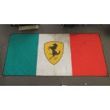 A large Ferrari/Italian track flag, 120cm x 270cm.