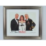 A signed colour publicity photograph from the 1998 film Dirty Rotten Scoundrels,