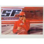 A signed coloured photograph of Kimi Raikkonen, Ferrari, mounted, with certificate, 29cm x 44cm.