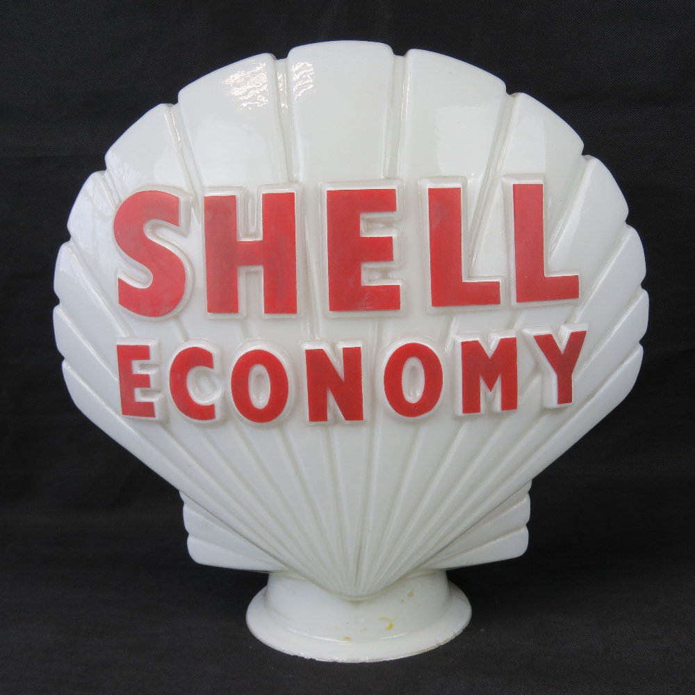 A vintage original glass advertising petrol pump globe for Shell Economy,