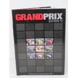 Book; Grand Prix Review 1992, hardback with dust wrapper, signed by Nigel Mansell.