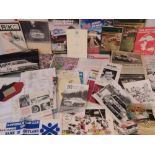 A collection of printed motor racing themed ephemera including;