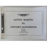 An Aston Martin V8 owners handbook, July 1988 edition.