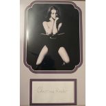 The famous picture of Christine Keeler with her signature, 27cm x 37cm. SIA.