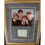 Display containing an autograph book page signed by all four Beatles in 1963, 38cm x 50cm, R&R COA.