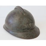 A WWII French Adrien helmet with liner.