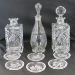 A pair of square glass spirit decanters