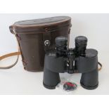 A pair of Canon 7 x 50 binoculars in bro