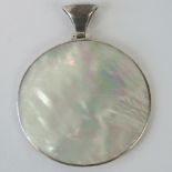 A silver and mother of pearl pendant, la