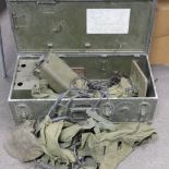 A vintage US military metal detector use