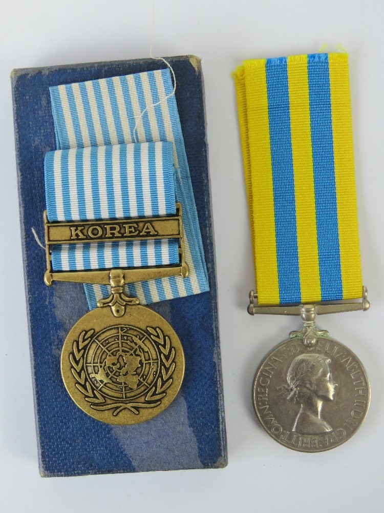 A Korea medal and a UN Korea medal in box, both with ribbons, one stamped 22559084 GNR. C.H.Scarth.