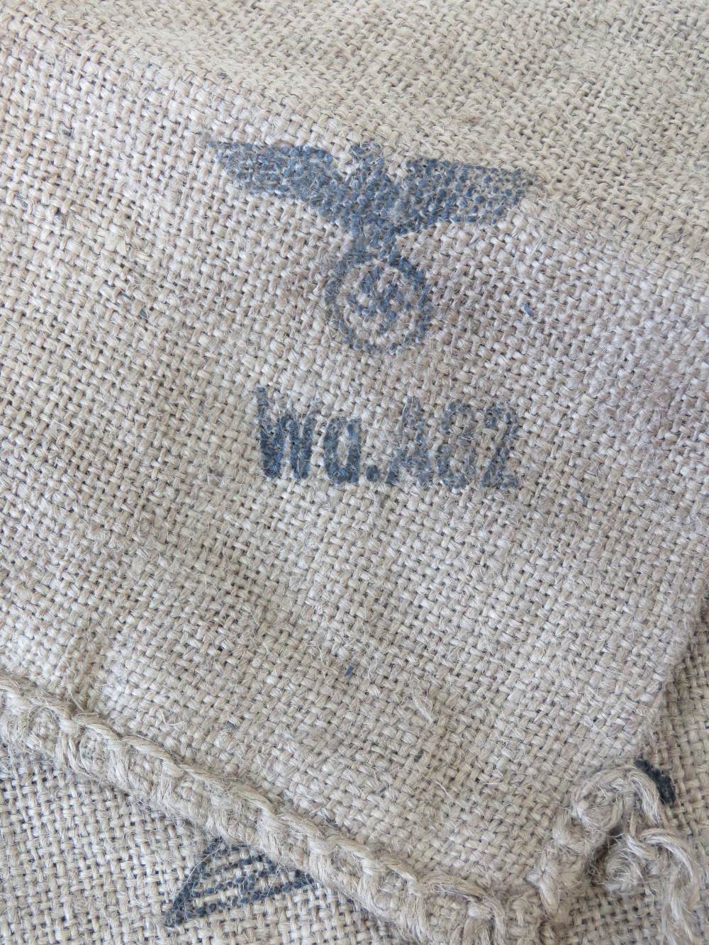 A WWII German hessian burlap sack with eagle swastika and dated 1944, 62cm x 30cm. - Image 2 of 2