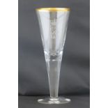 A large Imperial German conical glass wine goblet with etched regimental decoration and gilt rim