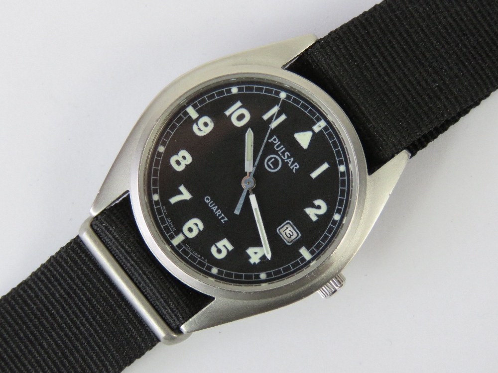 A Pulsar military wristwatch, stainless steel with black dial and luminous hands,