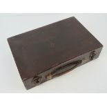 A WWII German wooden briefcase, top handle with two catches (one with lock),