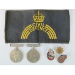 A quantity of WWII Homefront items including; Sterling silver AFS lapel badge, NFS lapel badge,