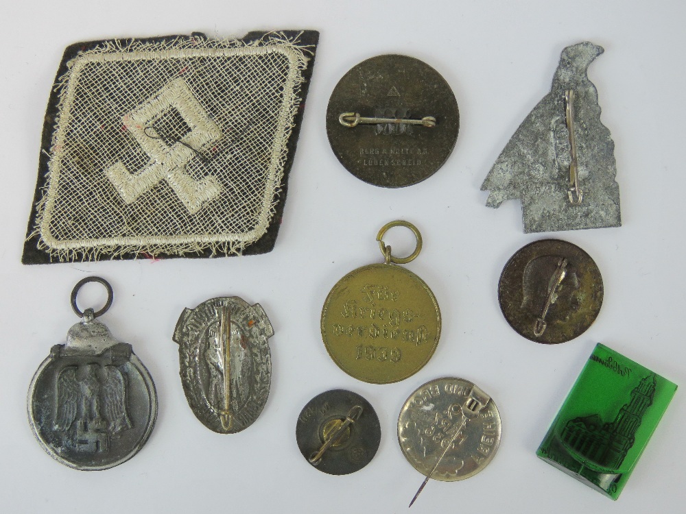 Ten WWII German badges and medals including; party badge marked RZM M1/120. - Image 2 of 2