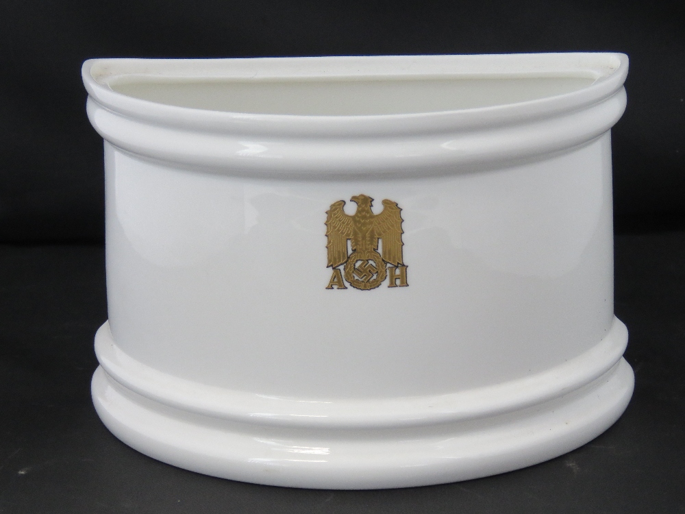 An Allach porcelain bough pot bearing Adolf Hitler's initials with eagle and swastika in gilt, 11.