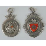 Two HM silver and enamelled L.S.S.A fobs, both hallmarked Birmingham 1924.