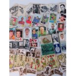 A quantity of assorted cigarette and collectors cards, including James Bond 007 and Football themes.