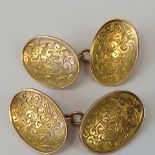 A pair of 9ct gold cufflinks, engraved frond design, hallmarked Chester 375, 8.9g.